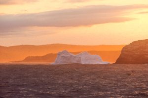 Iceberg in sunset, Witless Bay Ecological Reserve, Newfoundland, Canada